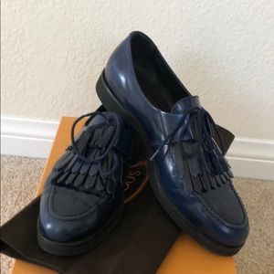 Tod’s  blue patent leather loafers